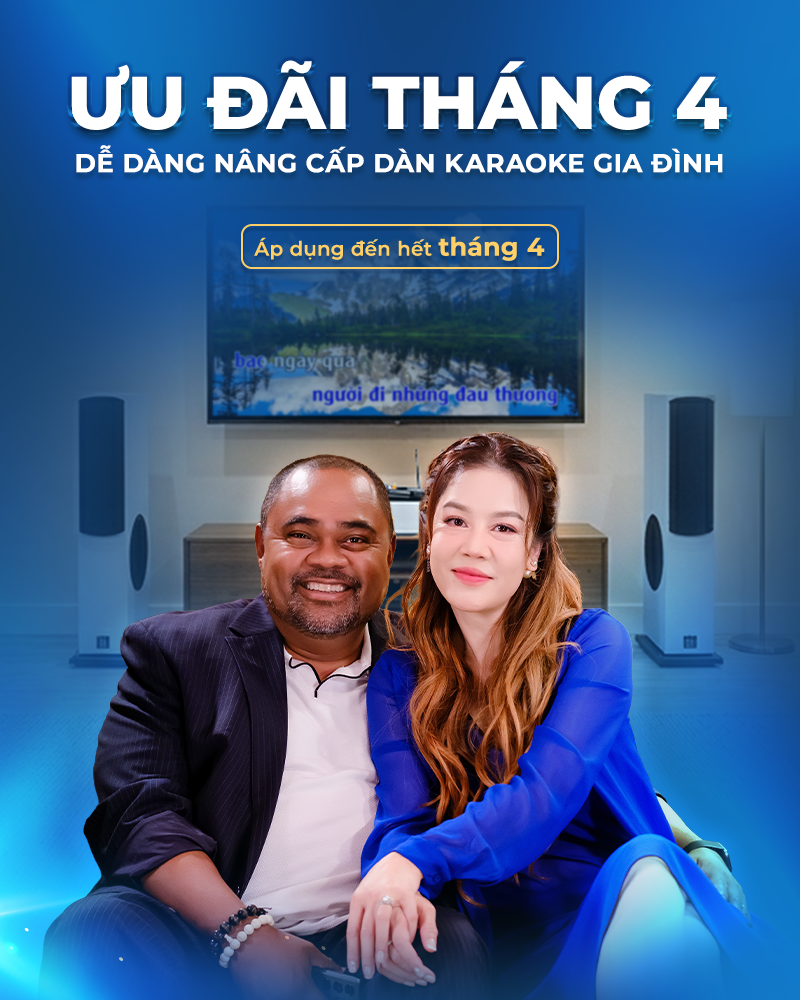 Couple sitting together with a TV displaying text in a room with speakers, promoting a karaoke system offer.